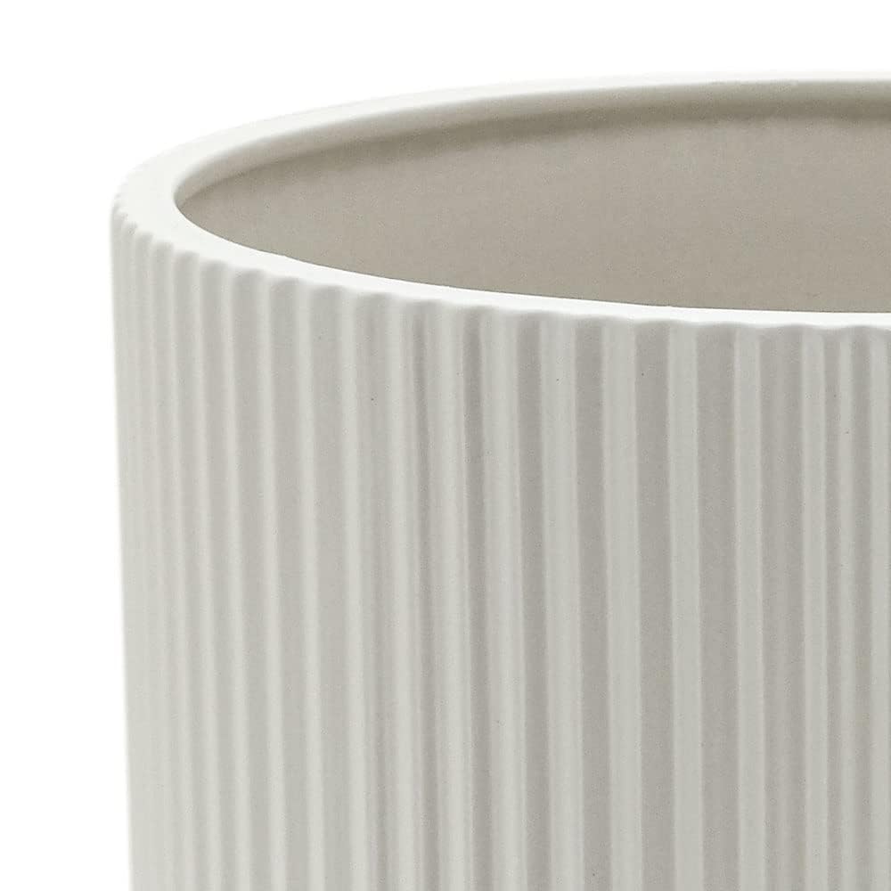 Amazon Basics white fluted ceramic planter suitable for indoor and outdoor settings.