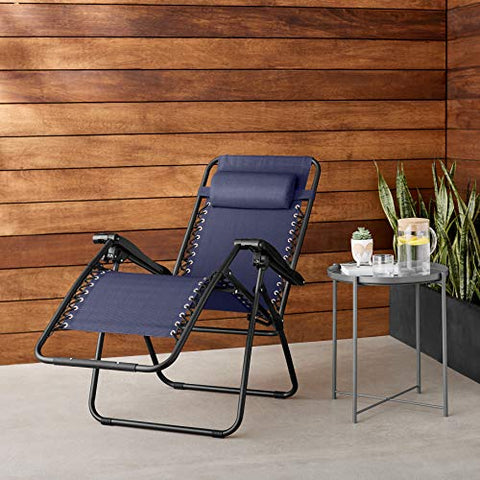 Amazon Basics lounge chair with reclining mechanism for easy position changes.