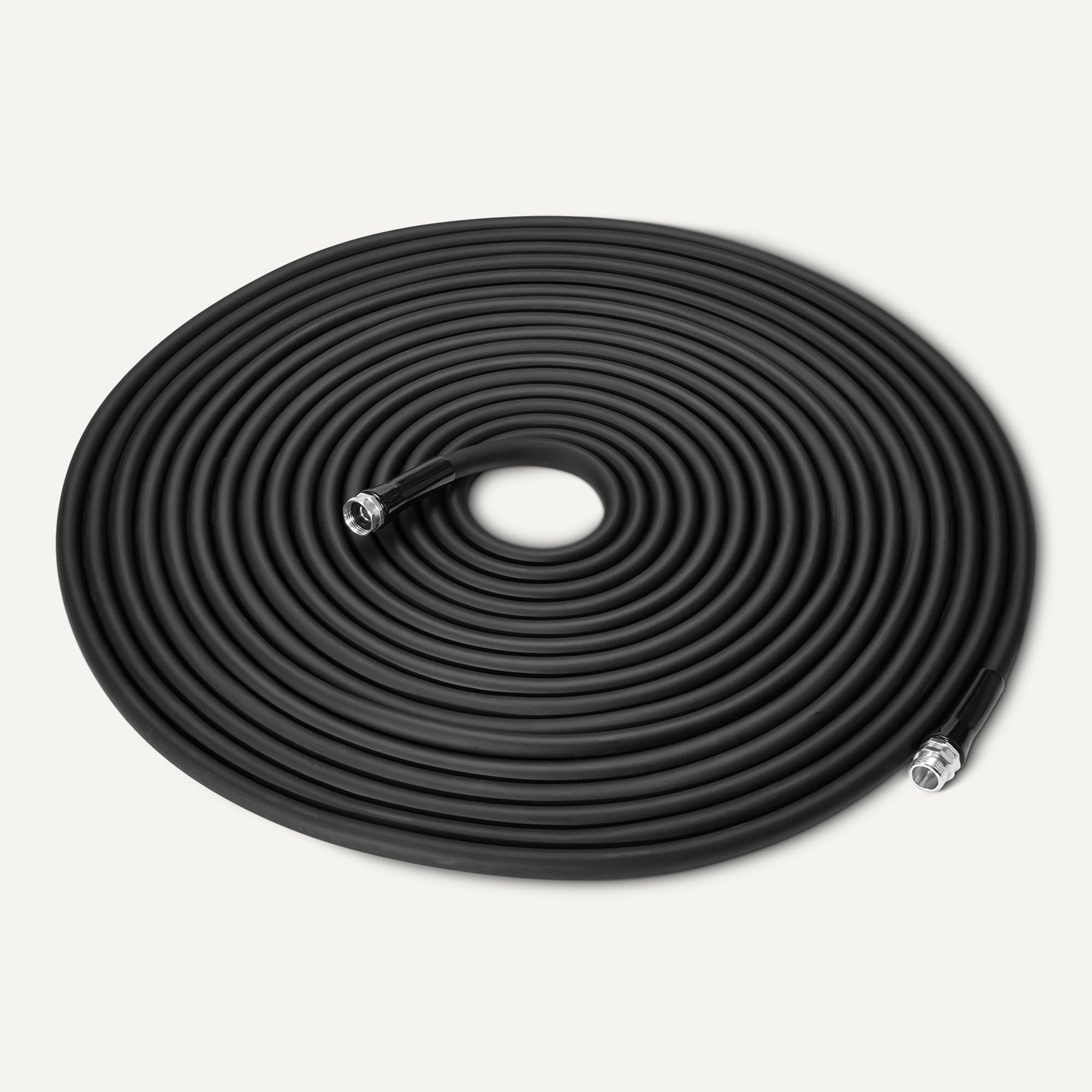 Amazon Basics garden hose aluminum fittings close-up showing durability