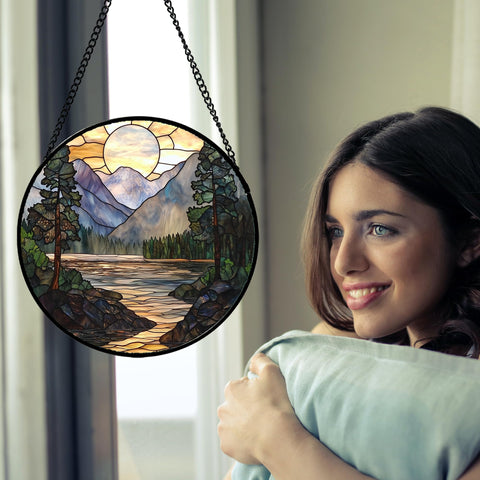 AMDERVEN glass suncatcher features forest and mountains for colorful art on glass.
