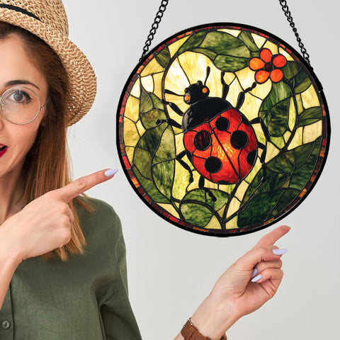 AMDERVEN flower design stained glass sun catcher fills space with warm, decorative hues.