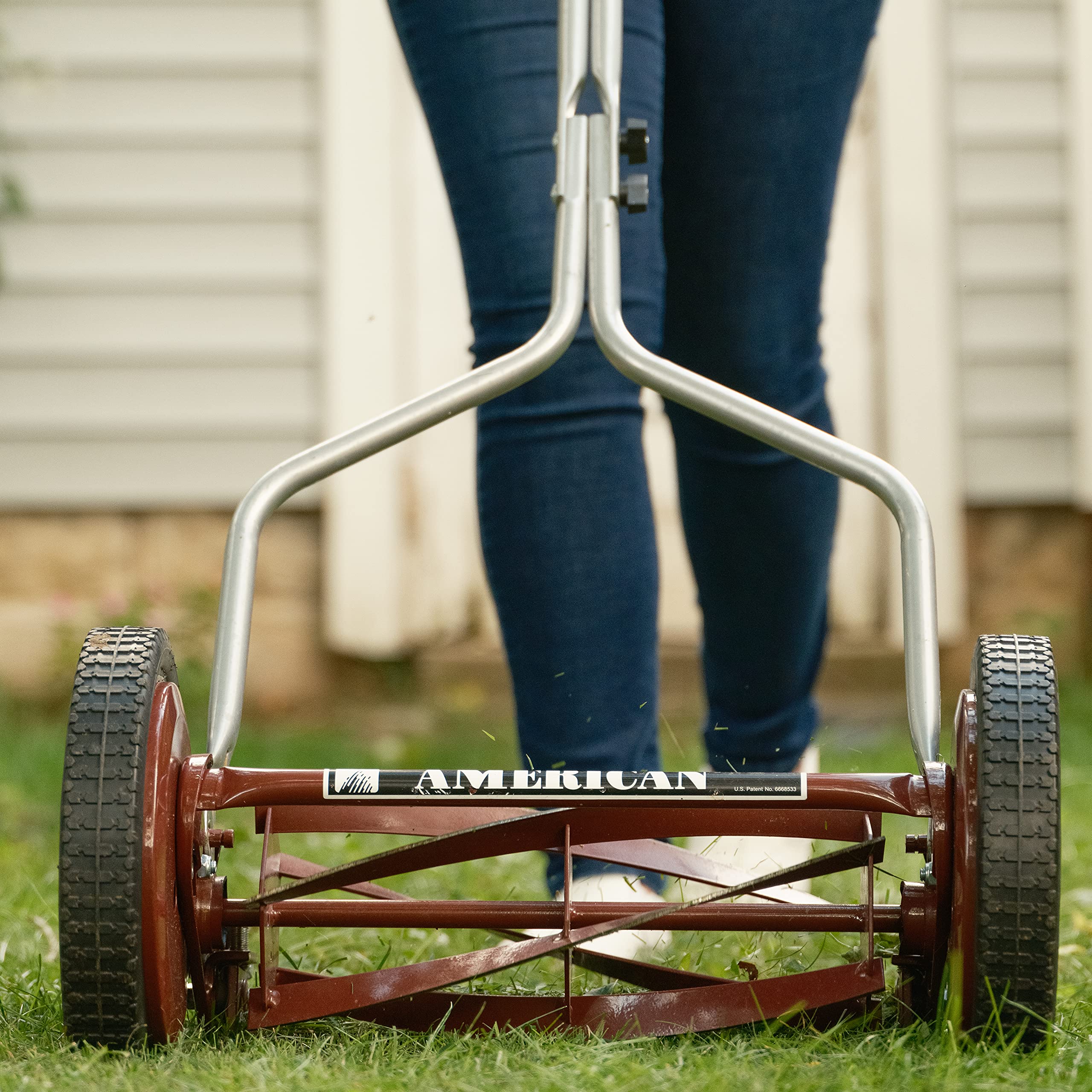 American Lawn Mower Company 1304-14 10-inch wheels improve stability on uneven ground.