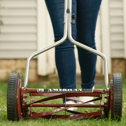 American Lawn Mower Company 1304-14 10-inch wheels improve stability on uneven ground.