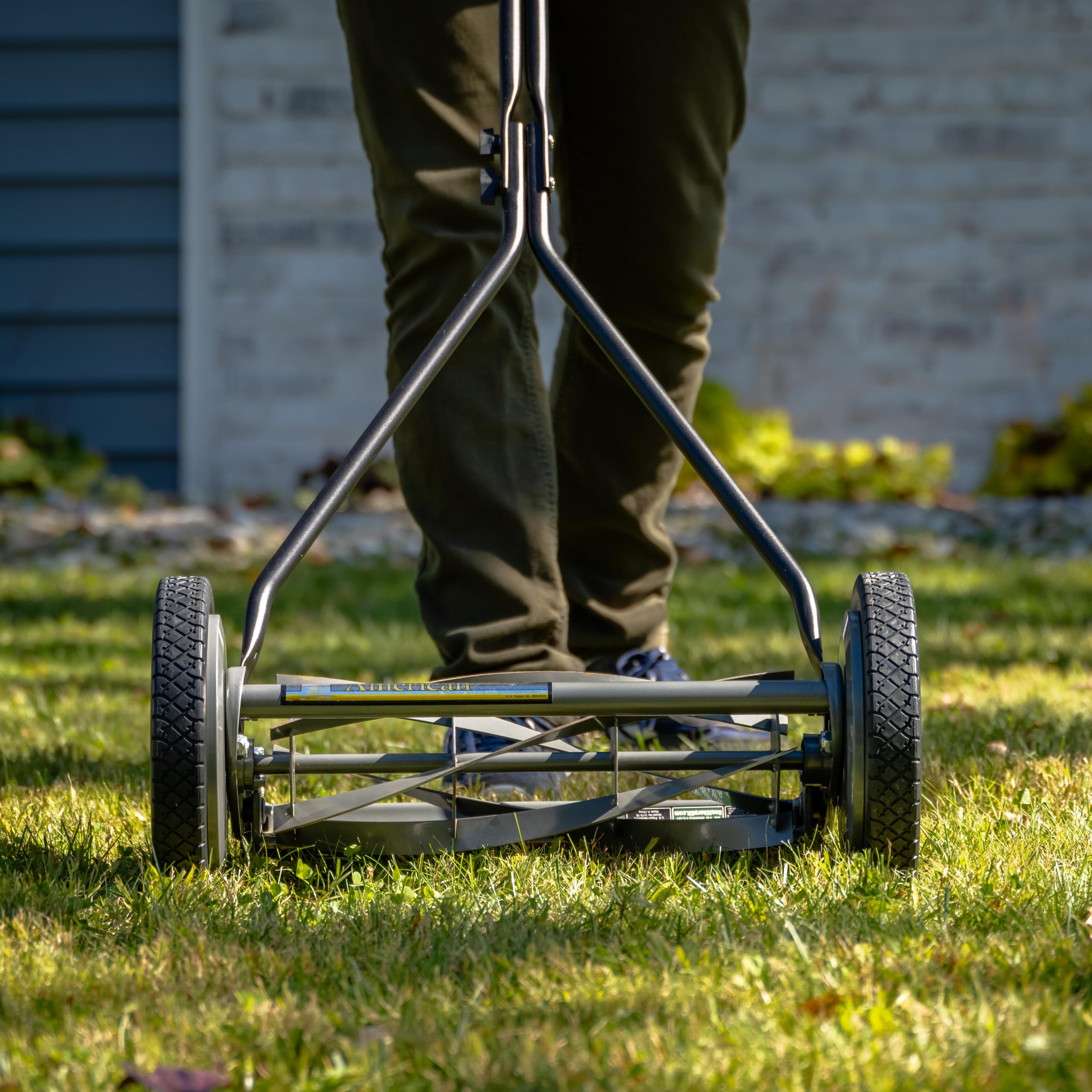 American Lawn Mower Company 1415-16 adjustable height enables precise cuts.