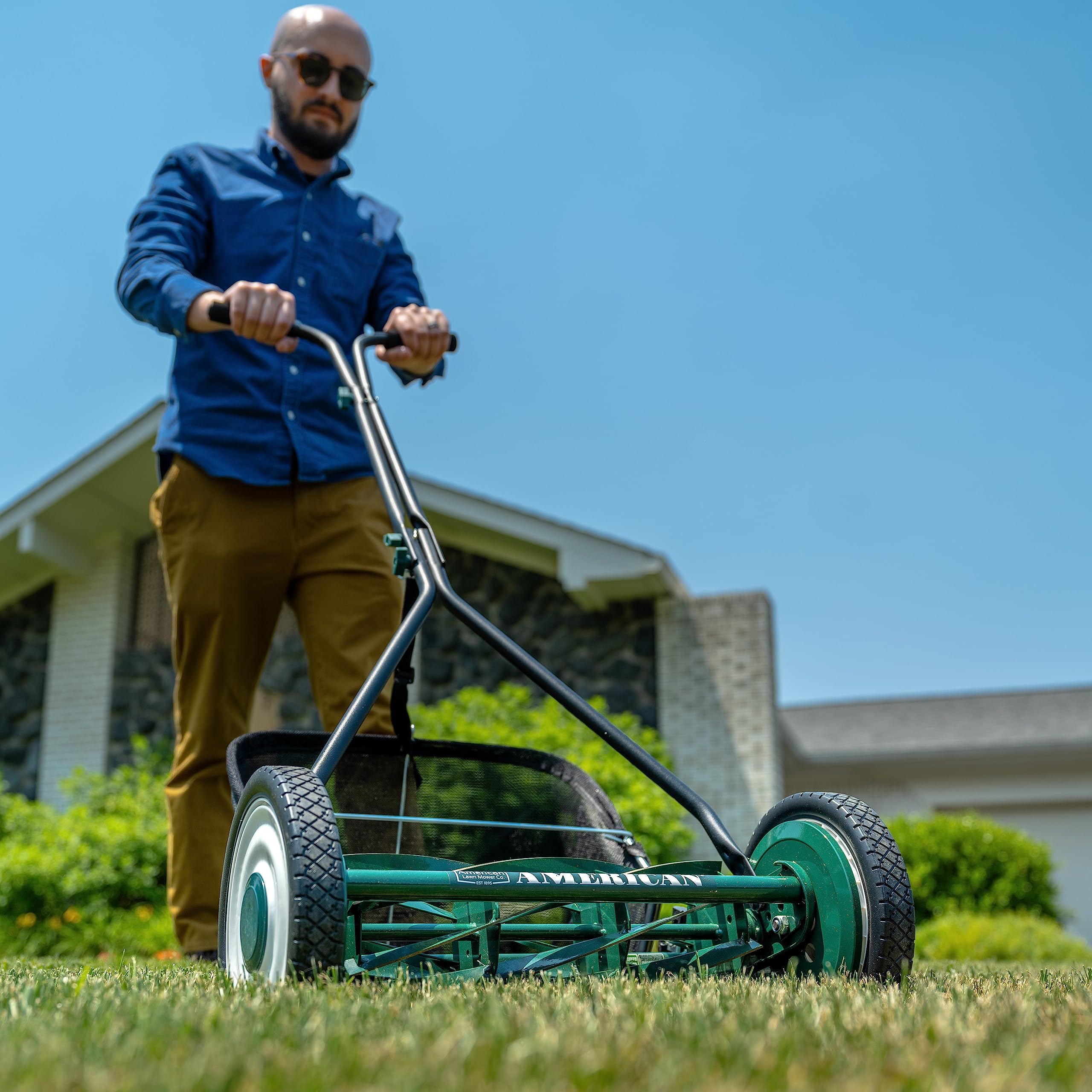 16-inch cutting width enables efficient mowing in tight spaces.
