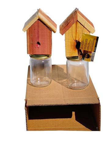 Amish-made wood carpenter bee trap mounted on eaves for easy placement.