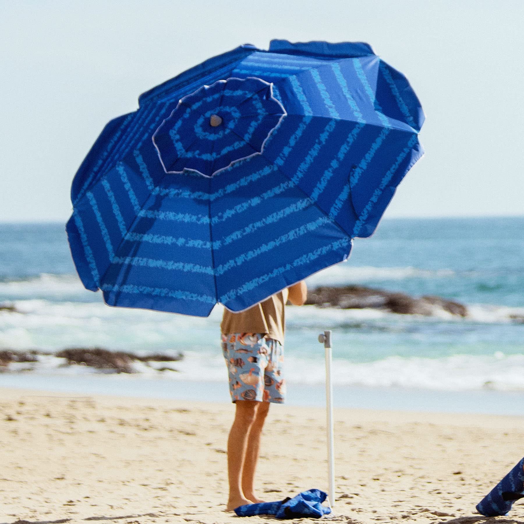 AMMSUN umbrella with UPF50+ protection reduces UV exposure outdoors.