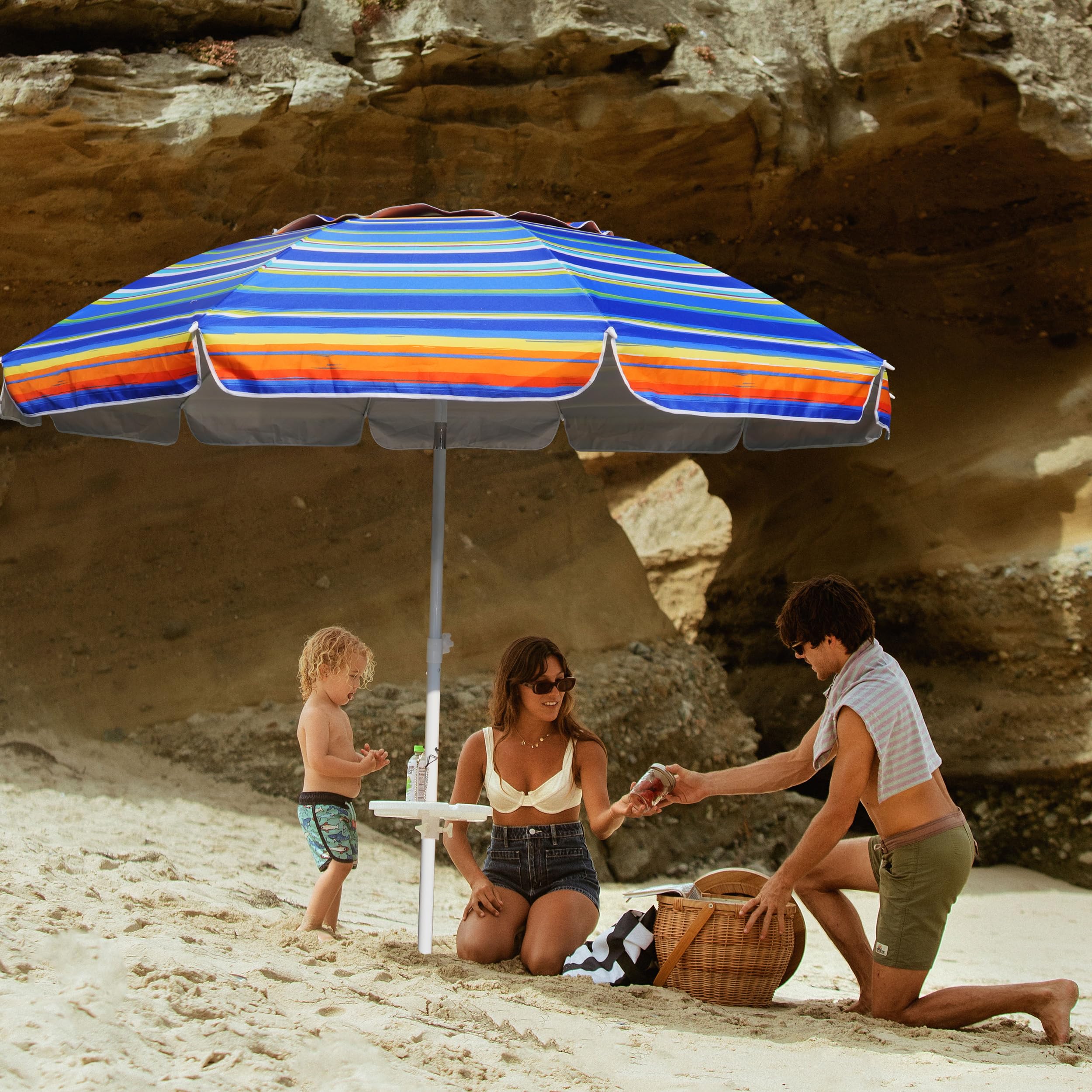 AMMSUN beach umbrella vented canopy reduces flutter for steadier shade.