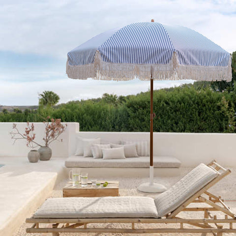AMMSUN fringe umbrella in navy stripes viewed from the top for tassel fringe detail.