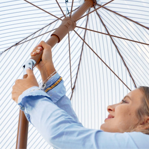 AMMSUN push-button tilt umbrella for adjustable sun protection as you move.