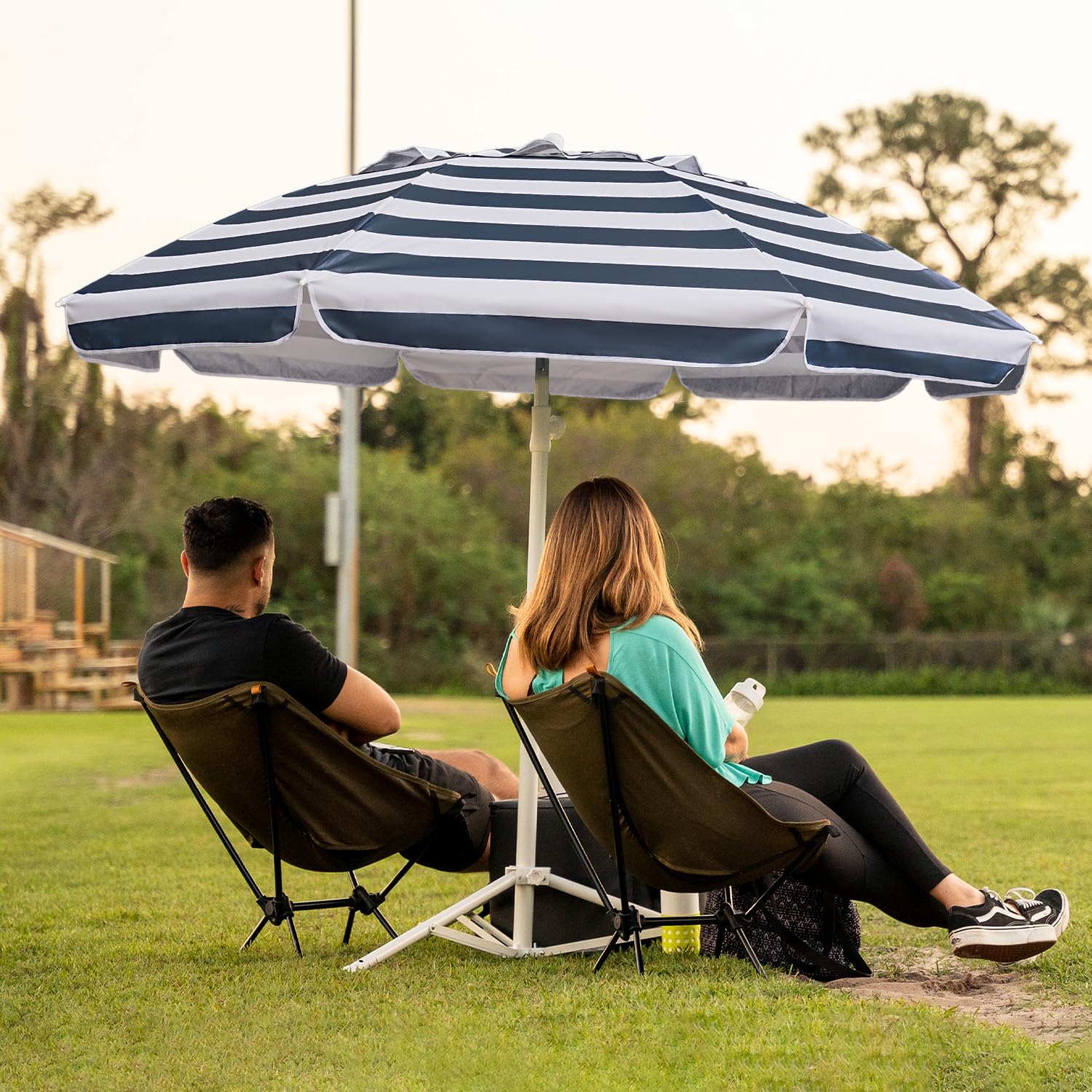 AMMSUN portable stand base keeps the umbrella stable on windy days.