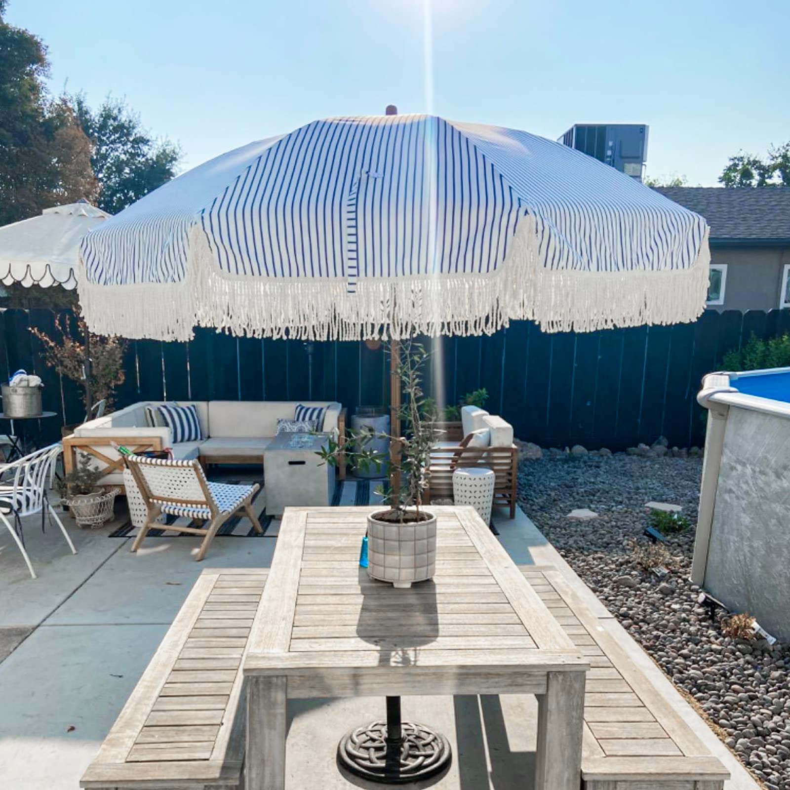 AMMSUN 7ft umbrella open to reveal broad shade coverage.