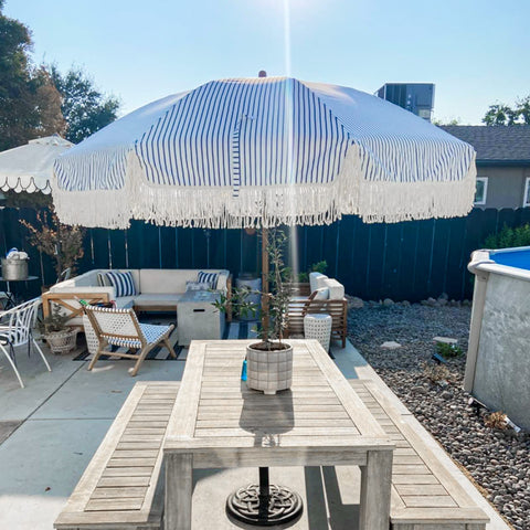 AMMSUN 7ft umbrella open to reveal broad shade coverage.