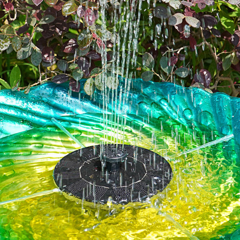AMZtime birdbath-scene fountain centers the display to attract birds with gentle movement.