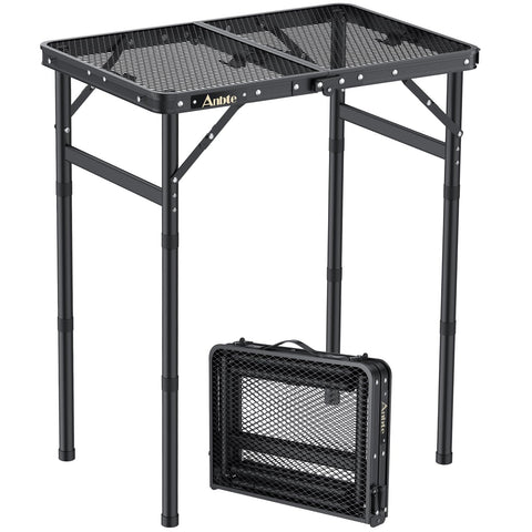 Anbte folding grill table being assembled for easy setup at a campsite.