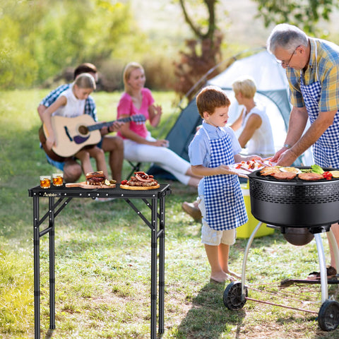 Anbte folding grill table height adjustment at multiple levels.