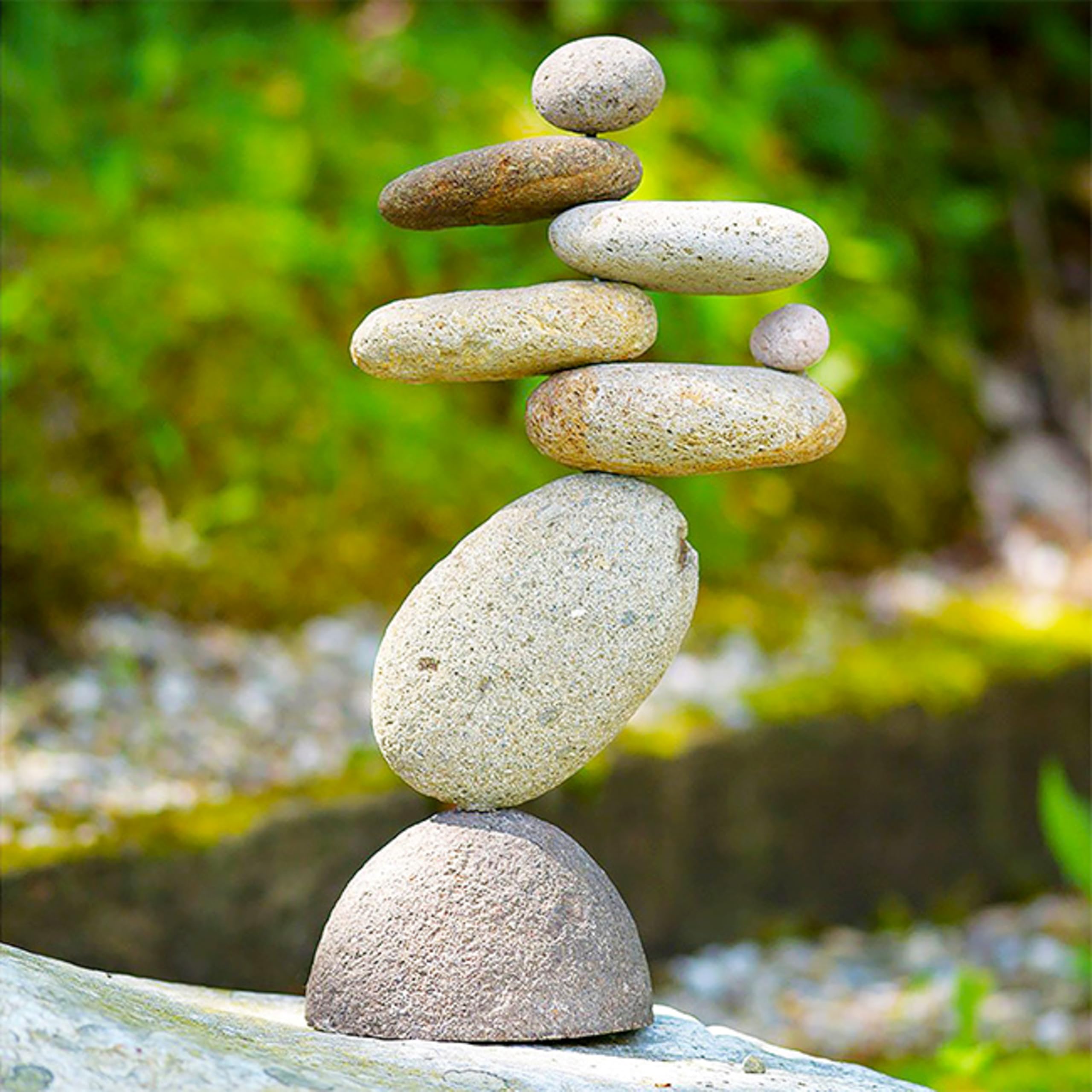 Ancient Graffiti balancing rocks tower with hidden rod for stability