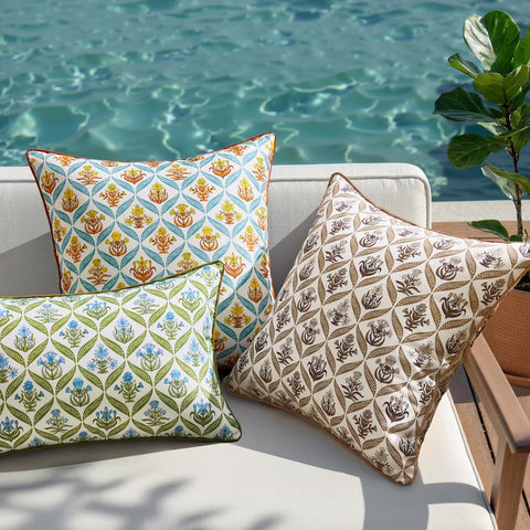 ANRODUO outdoor pillow cover shown on a patio setup for garden-oriented living spaces.