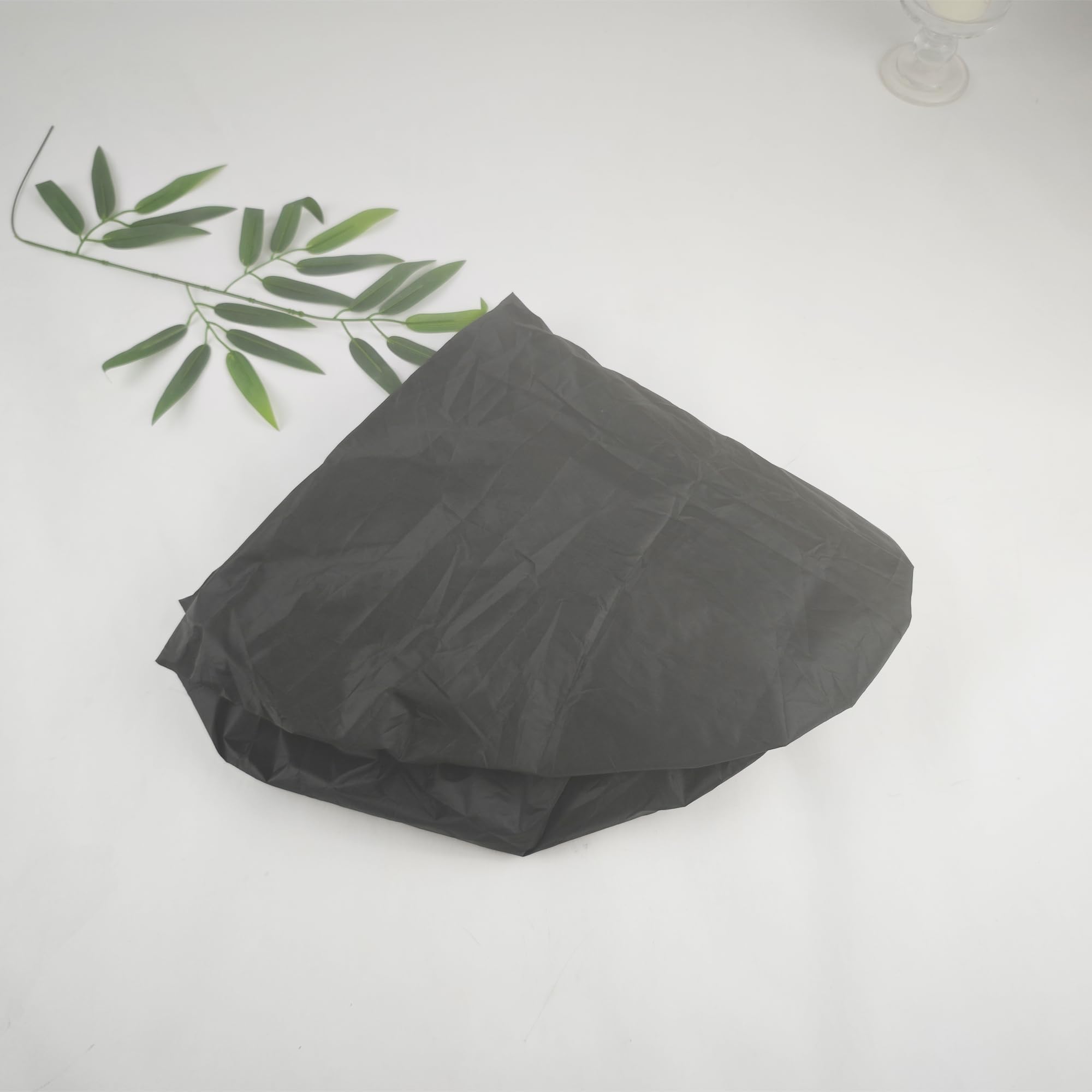 Aogigigio hose cover used in a garden patio setting