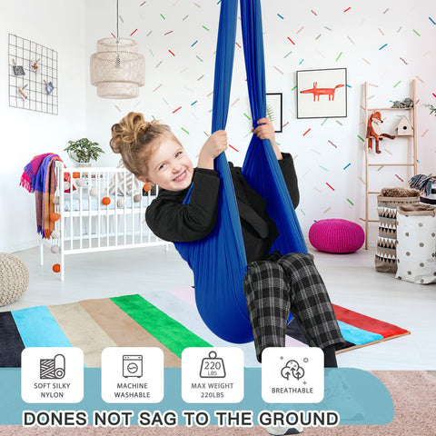 Child relaxing in the Aokitec blue hammock swing