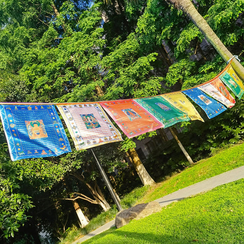 Aolamegs Lungta motifs promote calm energy in gardens.
