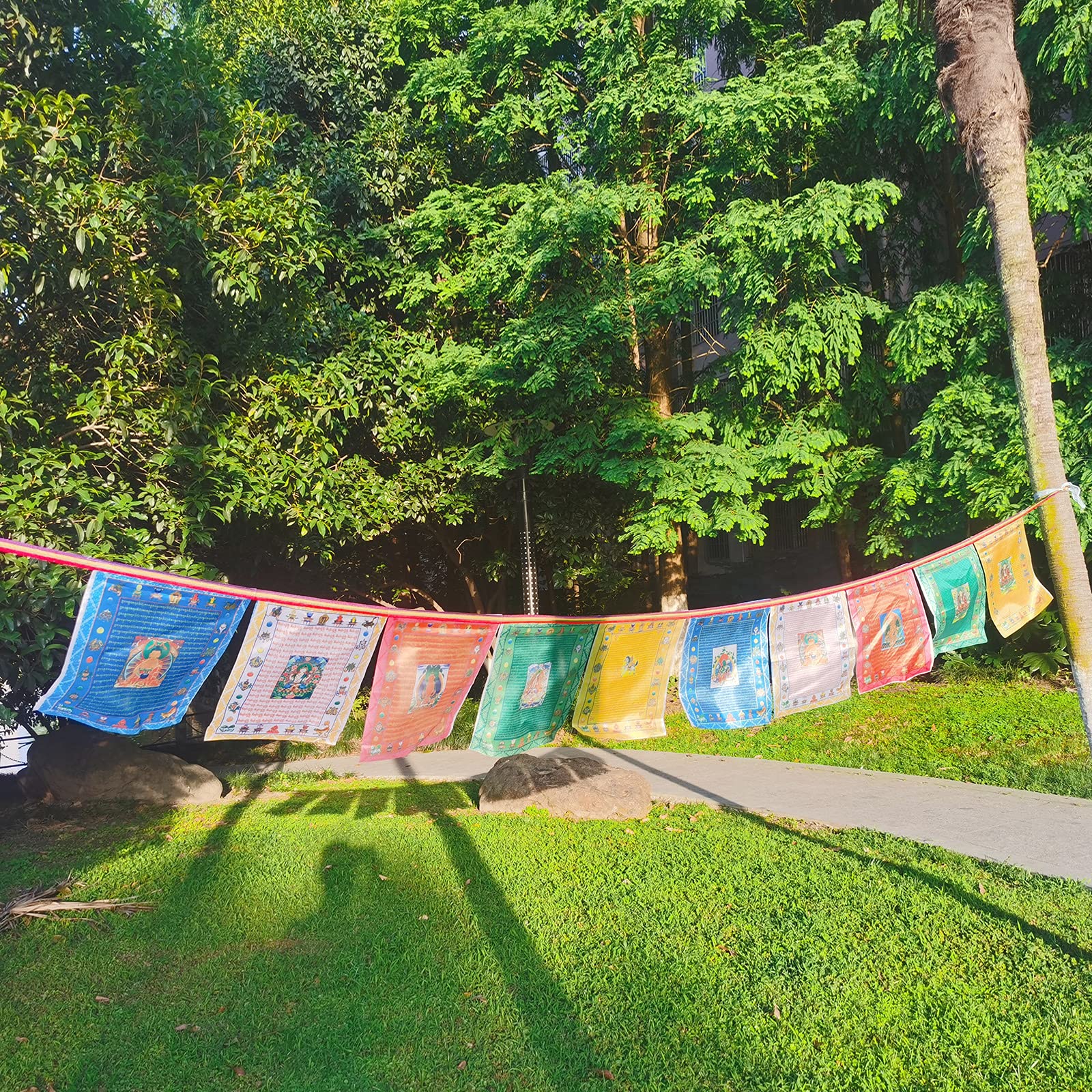 Aolamegs wind-charmed flags invite serenity in yoga corners.