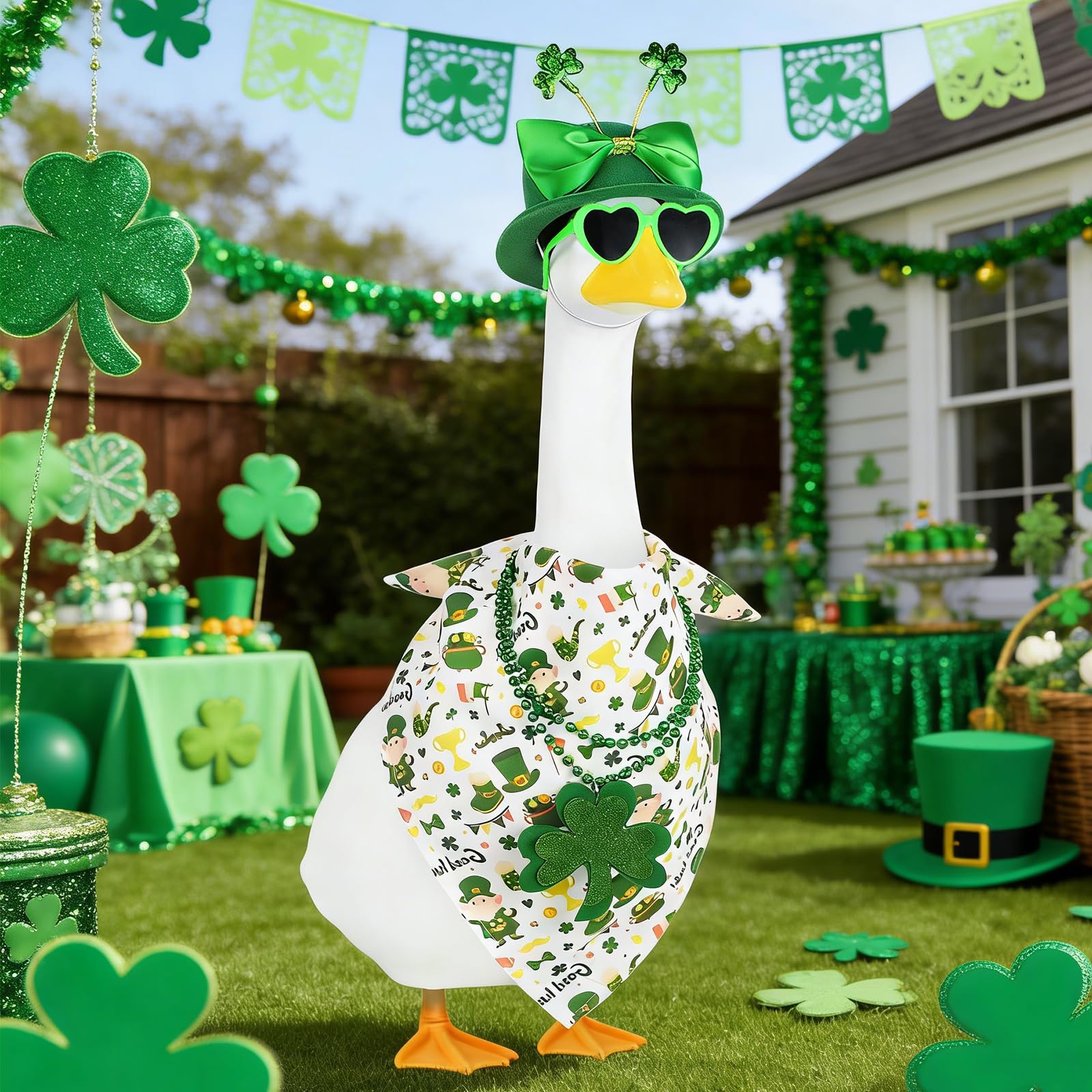 APHIUFR clover bow hat on goose statue adds whimsy to lawn display.