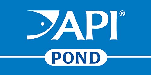 Pouring API Pond Accu-Clear into pond for treatment.