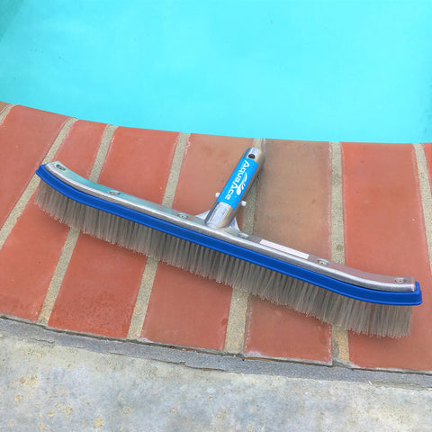 AquaAce Premium in use on a pool wall for thorough scrubbing.