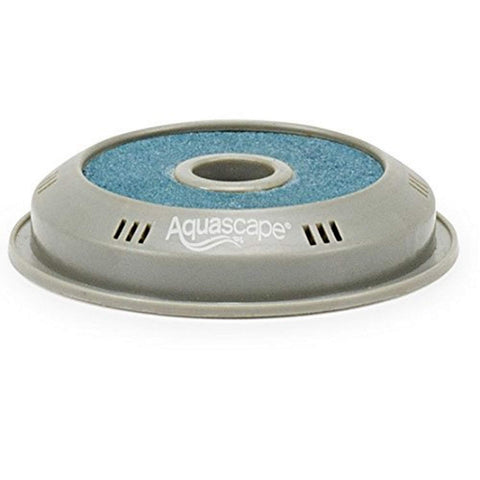 Aquascape pond aeration disc 75005 resting on the pond floor to promote aeration and water circulation