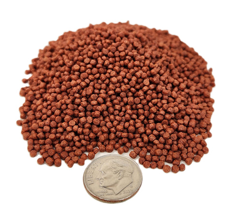 Floating pellets for baby tropical fish from Aquatic Foods Inc. — easy feeding and growth.