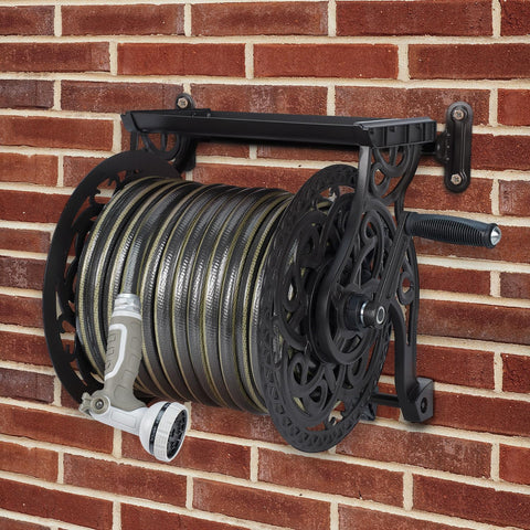 AQUAZILLA hose reel with integrated storage tray keeps nozzles and tools organized outdoors.
