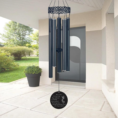 ARARTKEL memorial wind chimes placed in a garden for serene outdoor decor