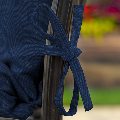 Back portion of Leala cushion in sapphire blue on chair