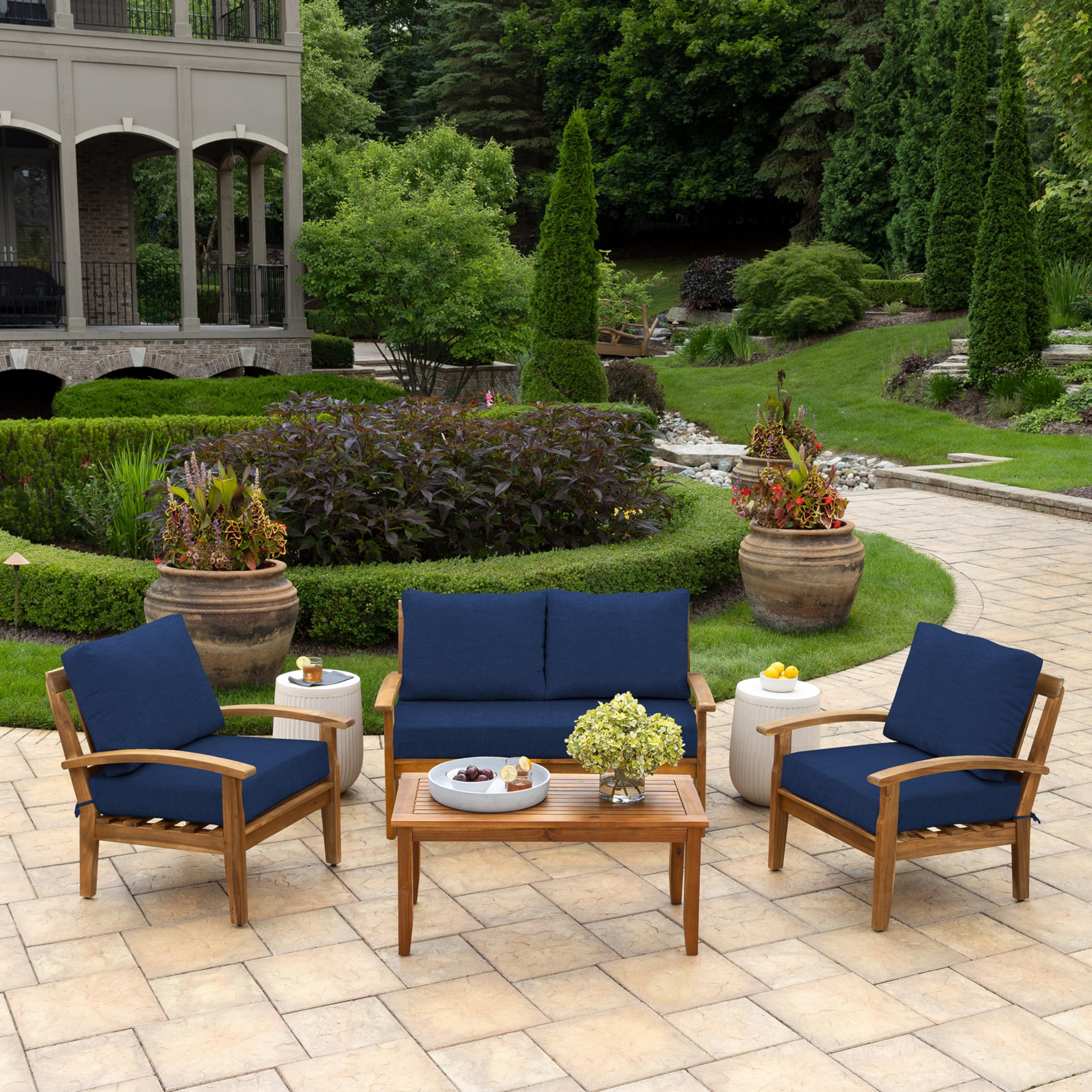 Arden Selections sapphire blue set of back pillows stacked for cozy patio seating