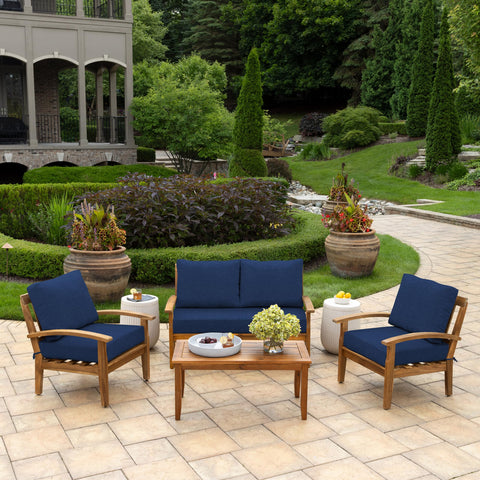 Arden Selections sapphire blue set of back pillows stacked for cozy patio seating