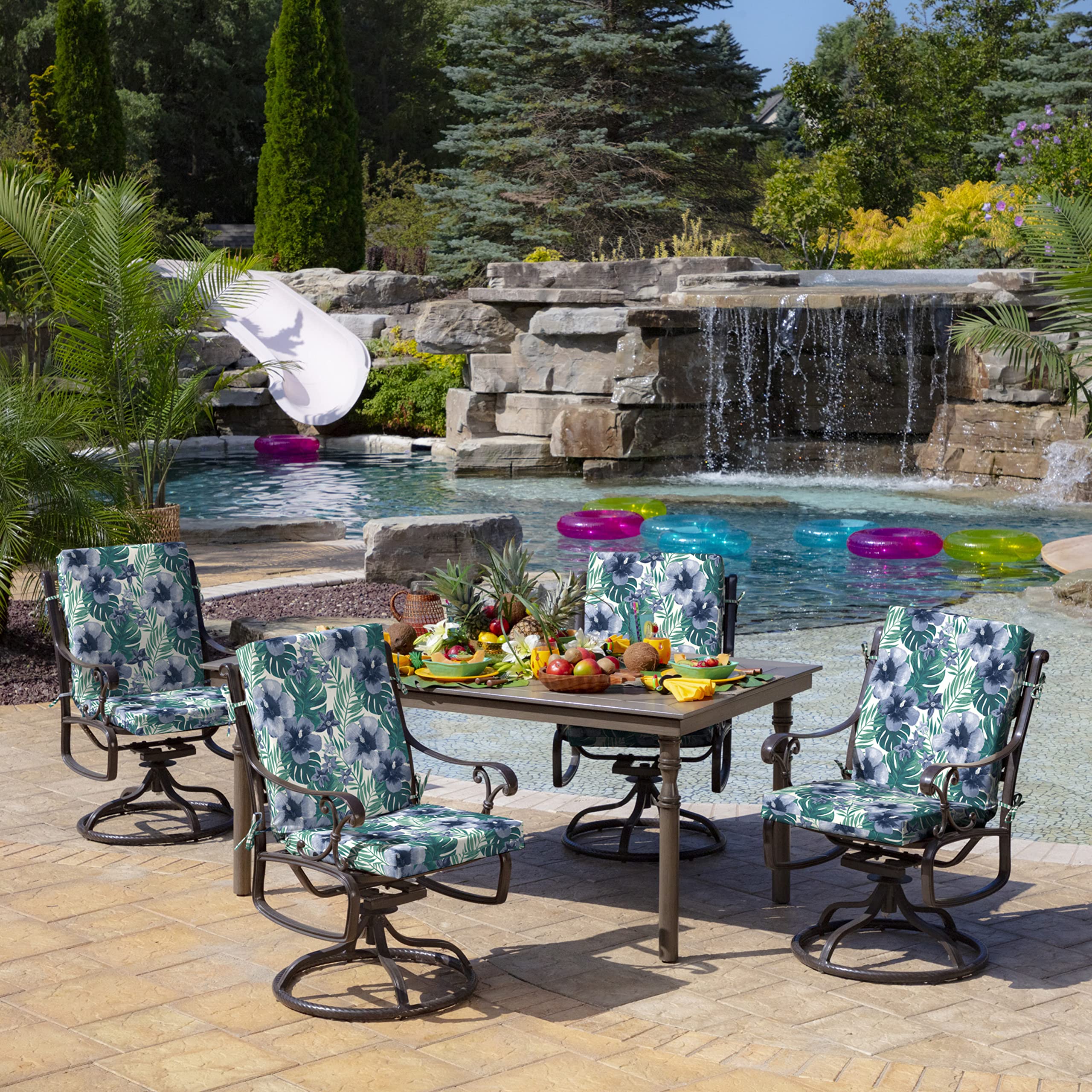 Moisture-repellent surface of Arden Selections Salome Tropical cushion on a sunny patio.