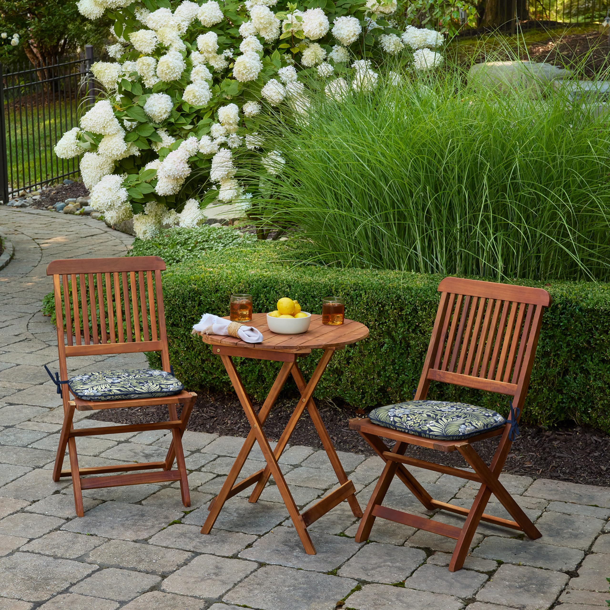 Arden Selections outdoor dining setup with two cushions, ideal for gatherings