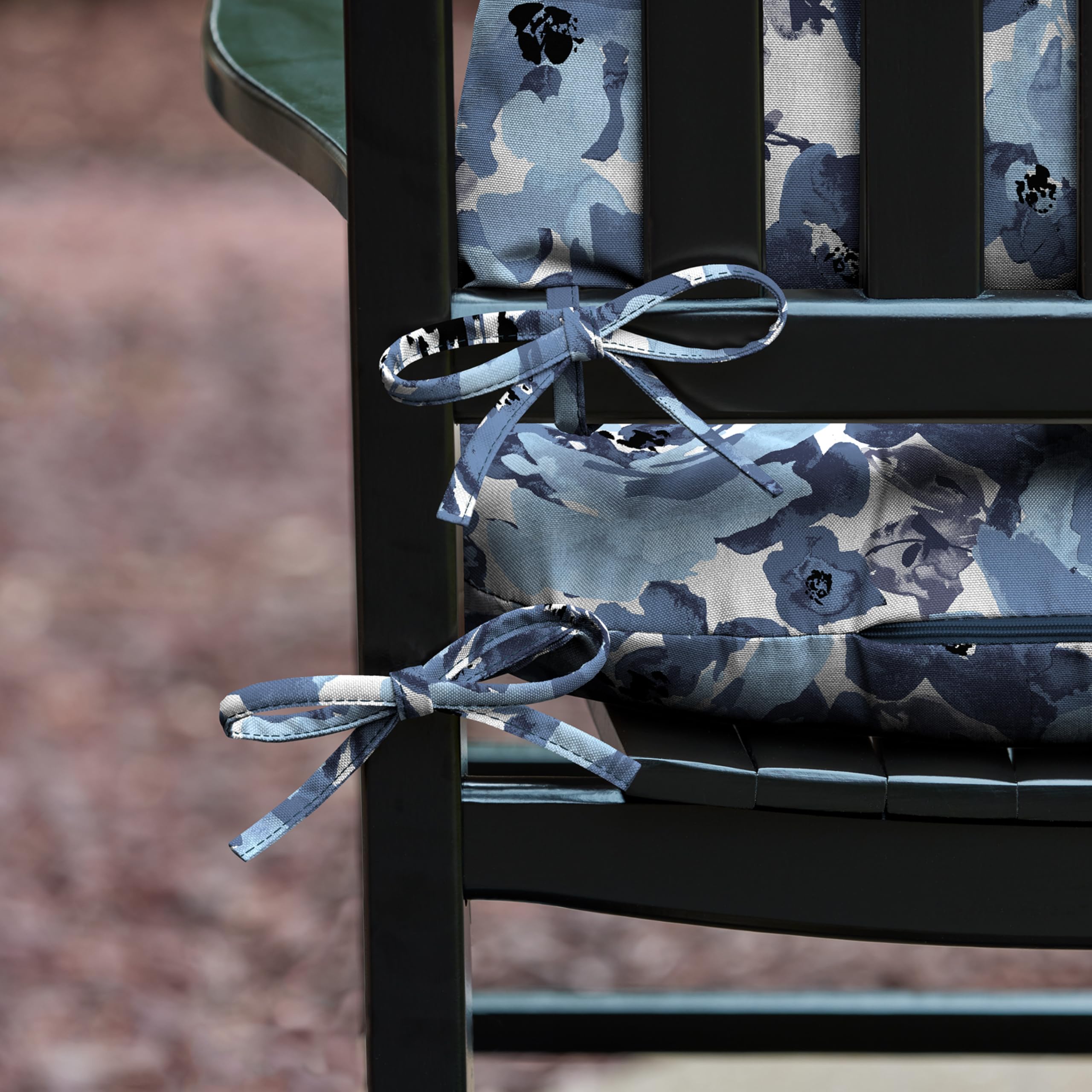 Arden Selections tufted-detail cushion adding a stylish touch to outdoor seating.