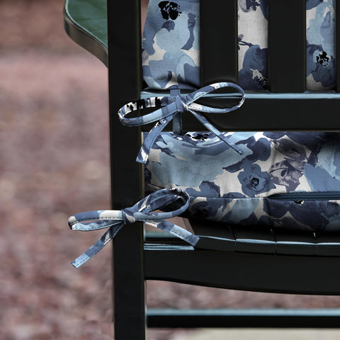 Arden Selections tufted-detail cushion adding a stylish touch to outdoor seating.