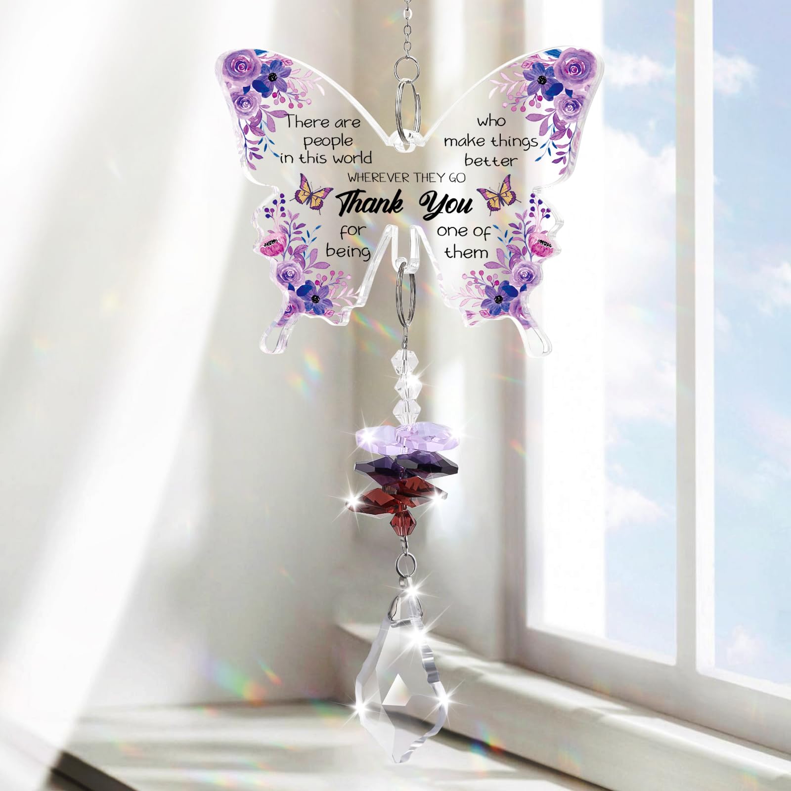 Aremdys crystal butterfly suncatcher in a sunny window creates a delicate rainbow glow.