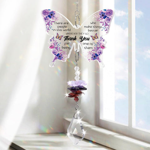 Aremdys crystal butterfly suncatcher in a sunny window creates a delicate rainbow glow.