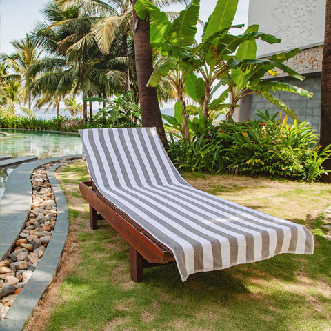 Arkwright lounge cover with 8-inch pocket keeps towels secure on windy days.