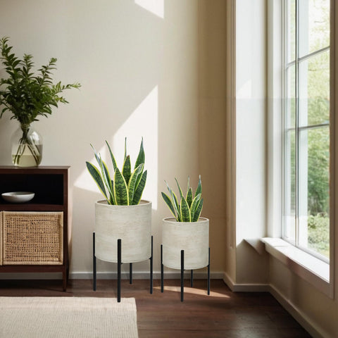 ARNIS dirt-colored finish complements greenery in any room.