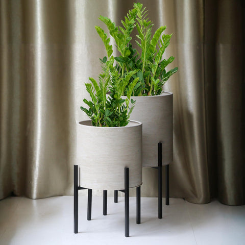 ARNIS 17-inch planter with stand ideal for compact spaces and doorway entries.