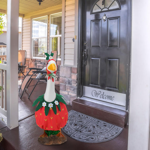 Arrowbash goose outfit with green leaf accents for vibrant garden decor.