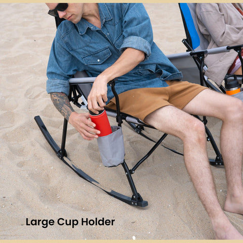 ARROWHEAD OUTDOOR rocking chair with side pocket for essentials within reach.