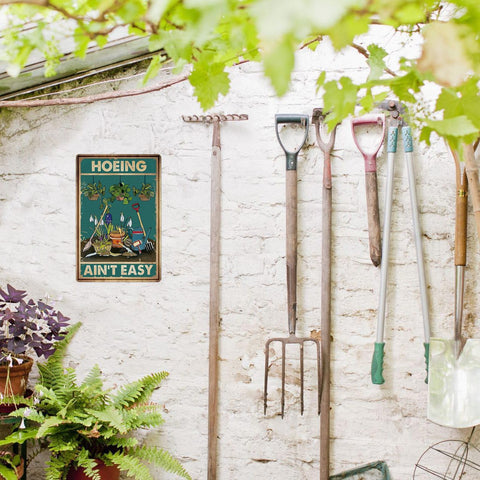 Artlunar outdoor sign on fence: adds personality to backyard decor.