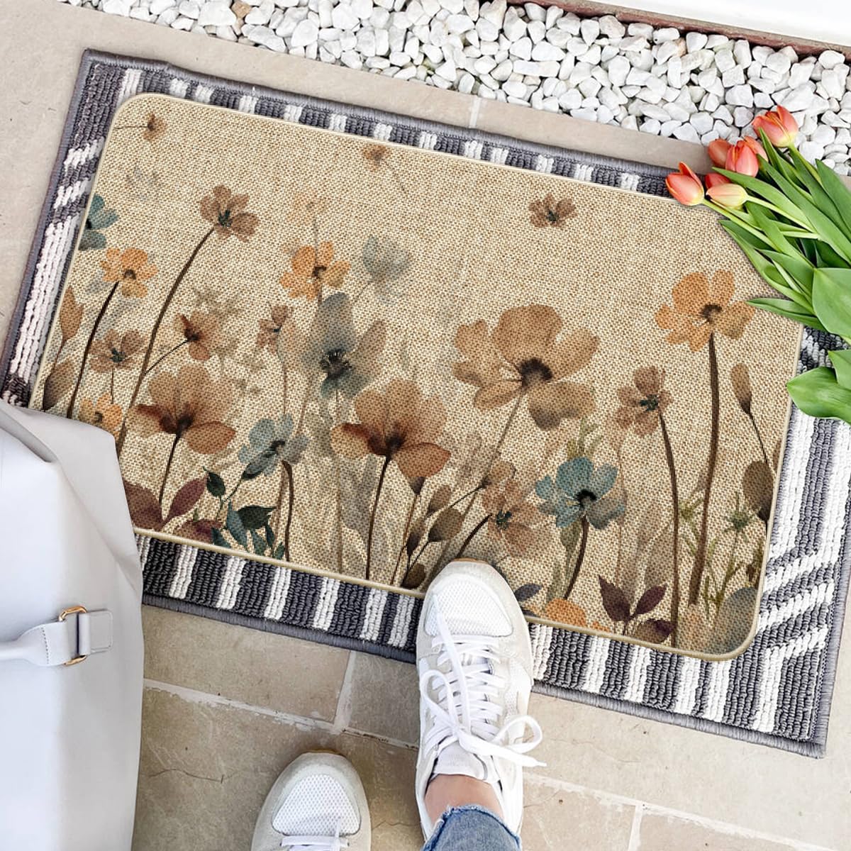 Artoid Mode indoor outdoor welcome rug cleans easily with hose and mild detergent.