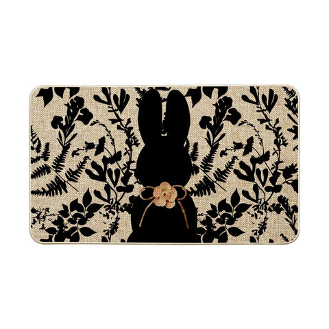 Artoid Mode Black Rabbit Leaves Easter Doormat featuring a seasonal bunny pattern for welcoming entryways.